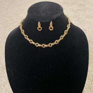 Yellow gold tone earrings and necklace